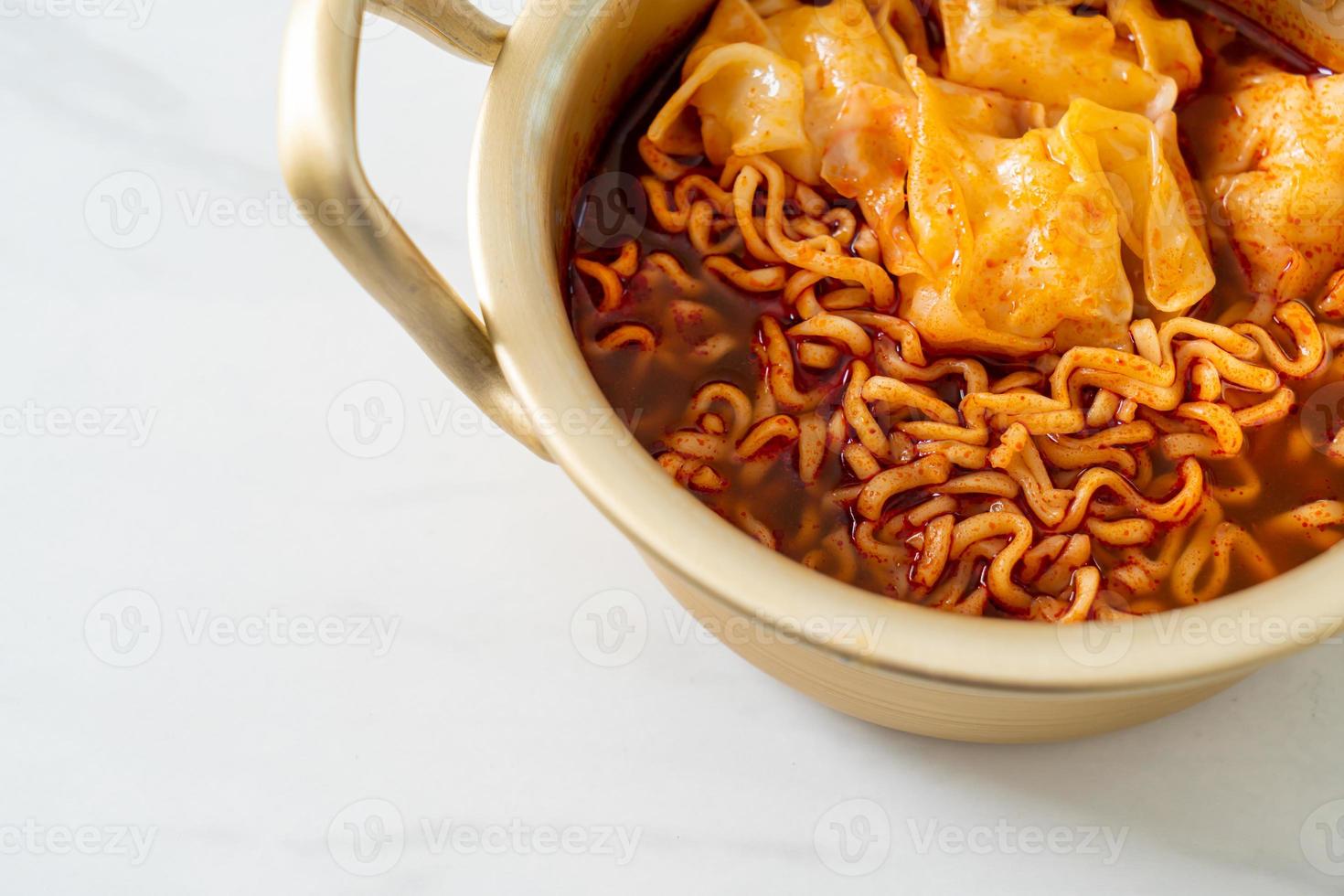 Korean instant noodles with dumplings photo