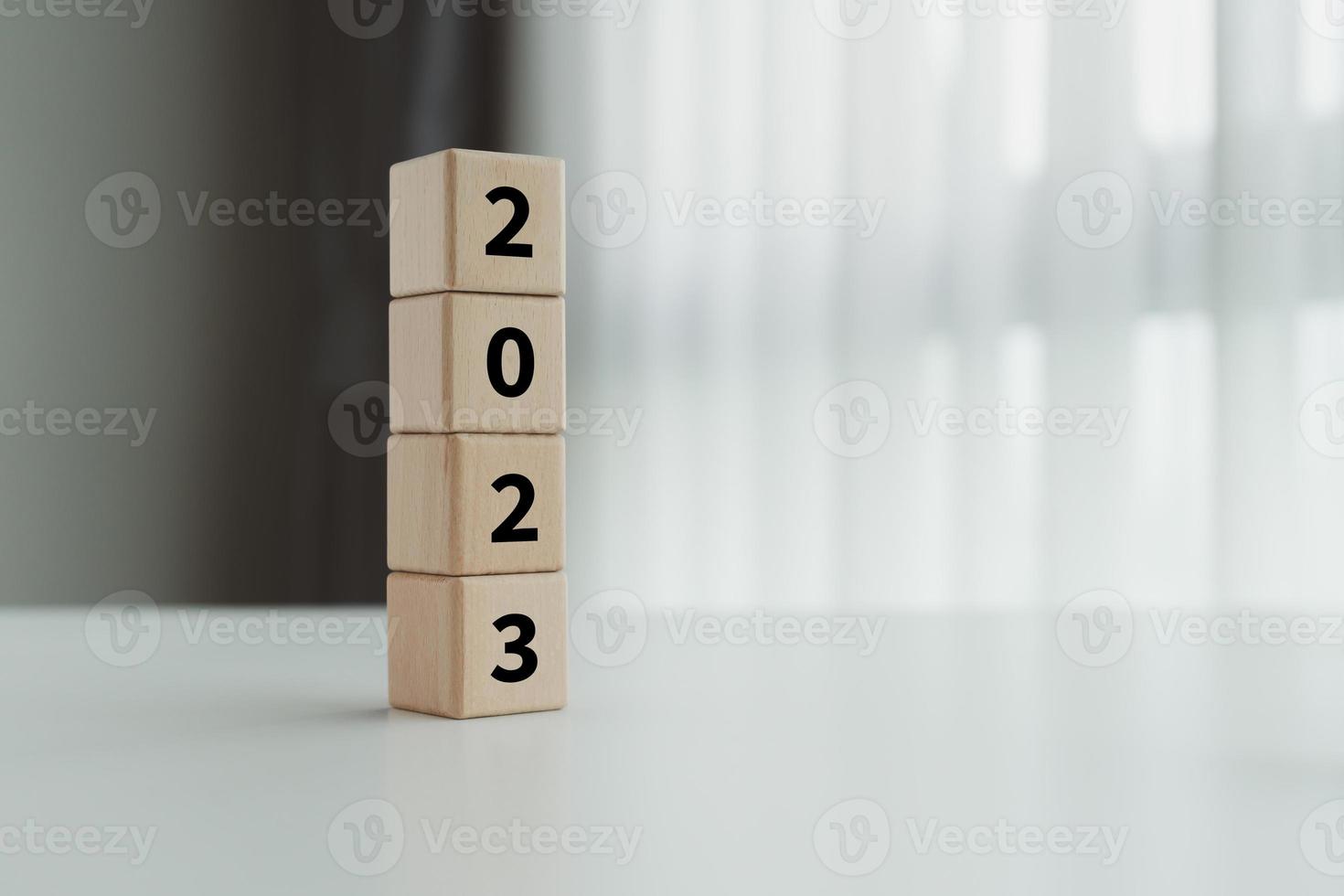 2023 new year challenge goal and target, Achievement, business success. 2023 on stack of wooden block. Set strategy and plan for future. Background for Merry christmas and Happy new year 2023. photo