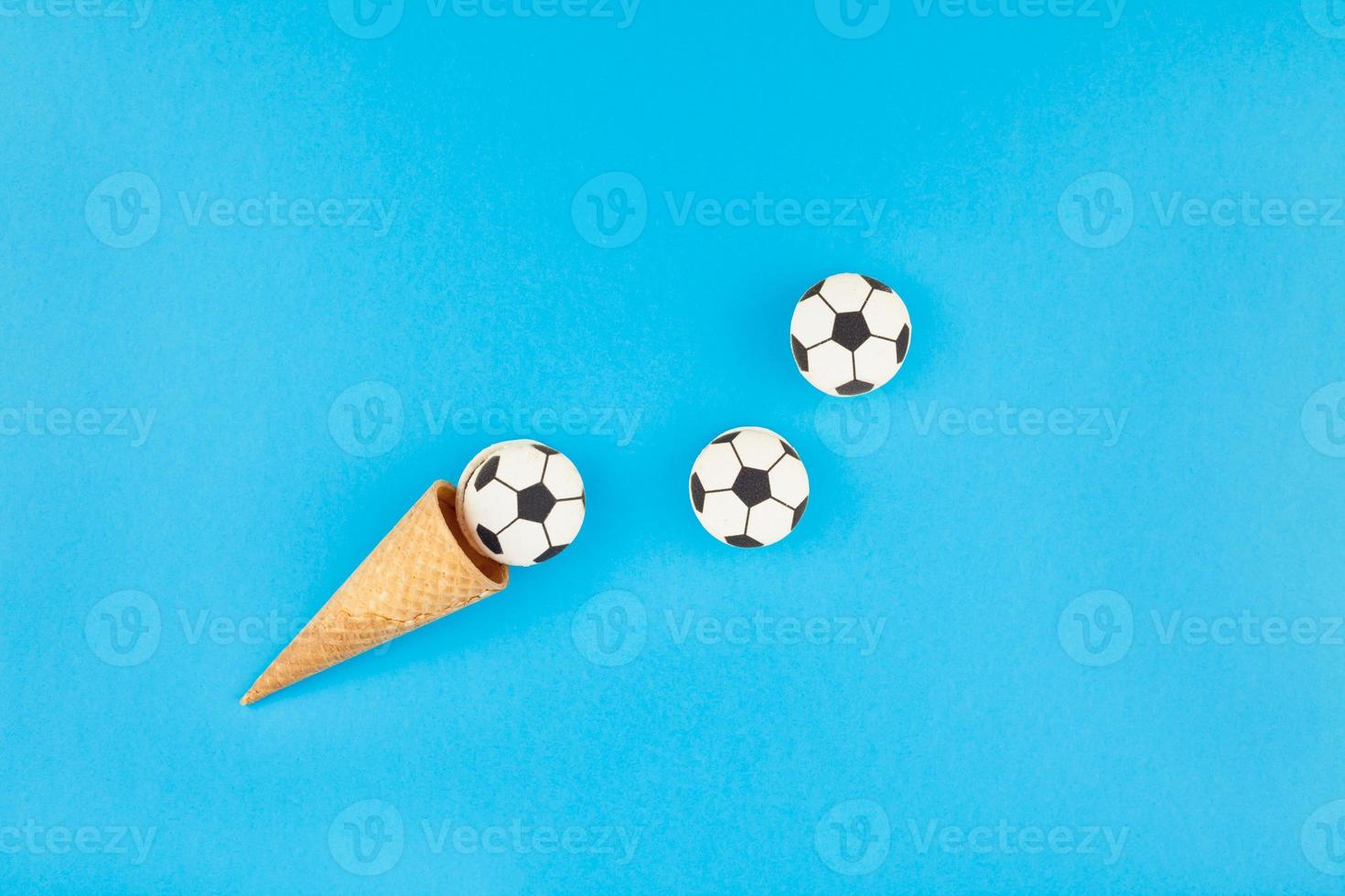 Football macaroons in waffle cones photo