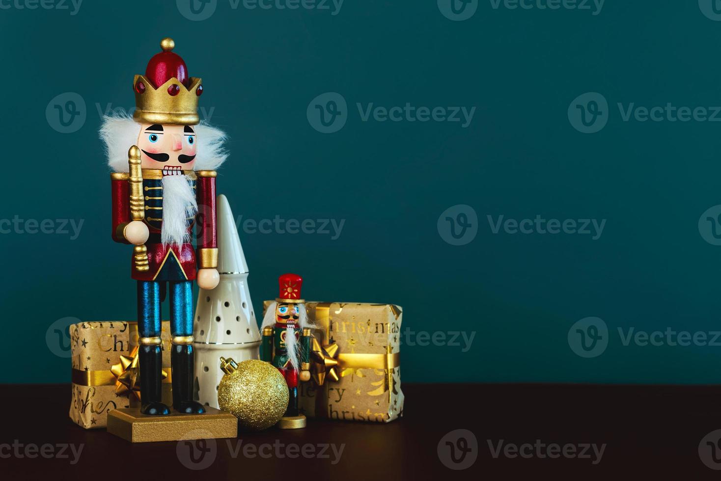 Christmas concept background. Christmas wooden nutcracker toy soliders and christmas ornament with space for text. Christmas toys concept photo