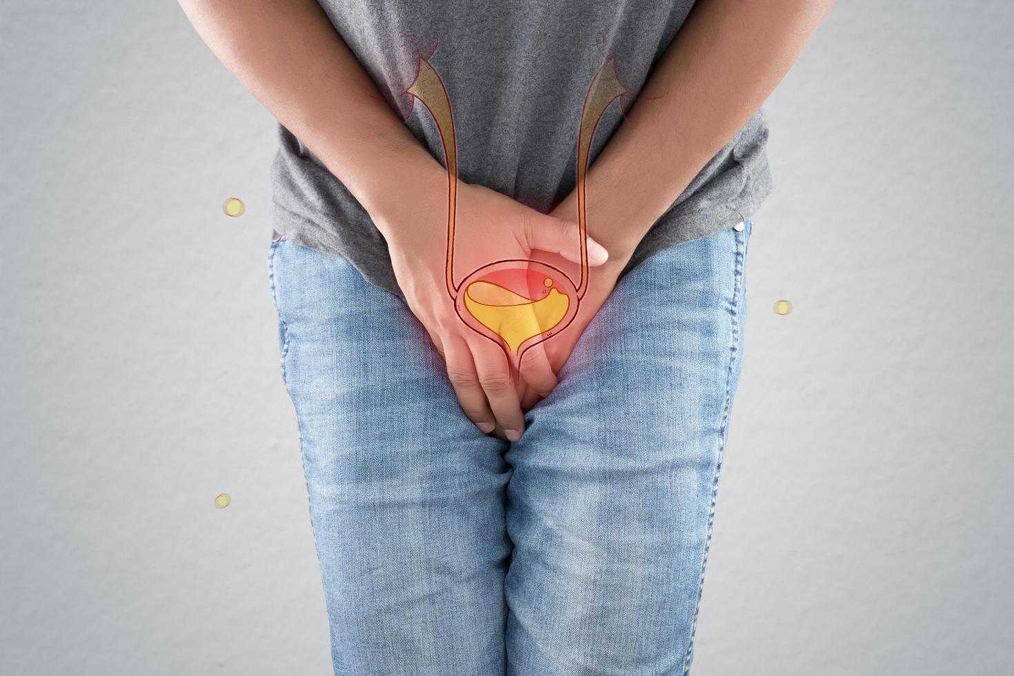 Man wants to pee and is holding his bladder, Urinary incontinence concept photo
