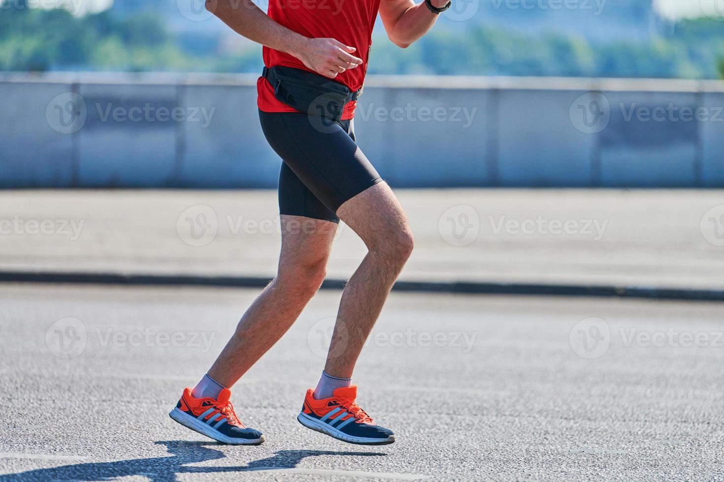 Running man on road photo