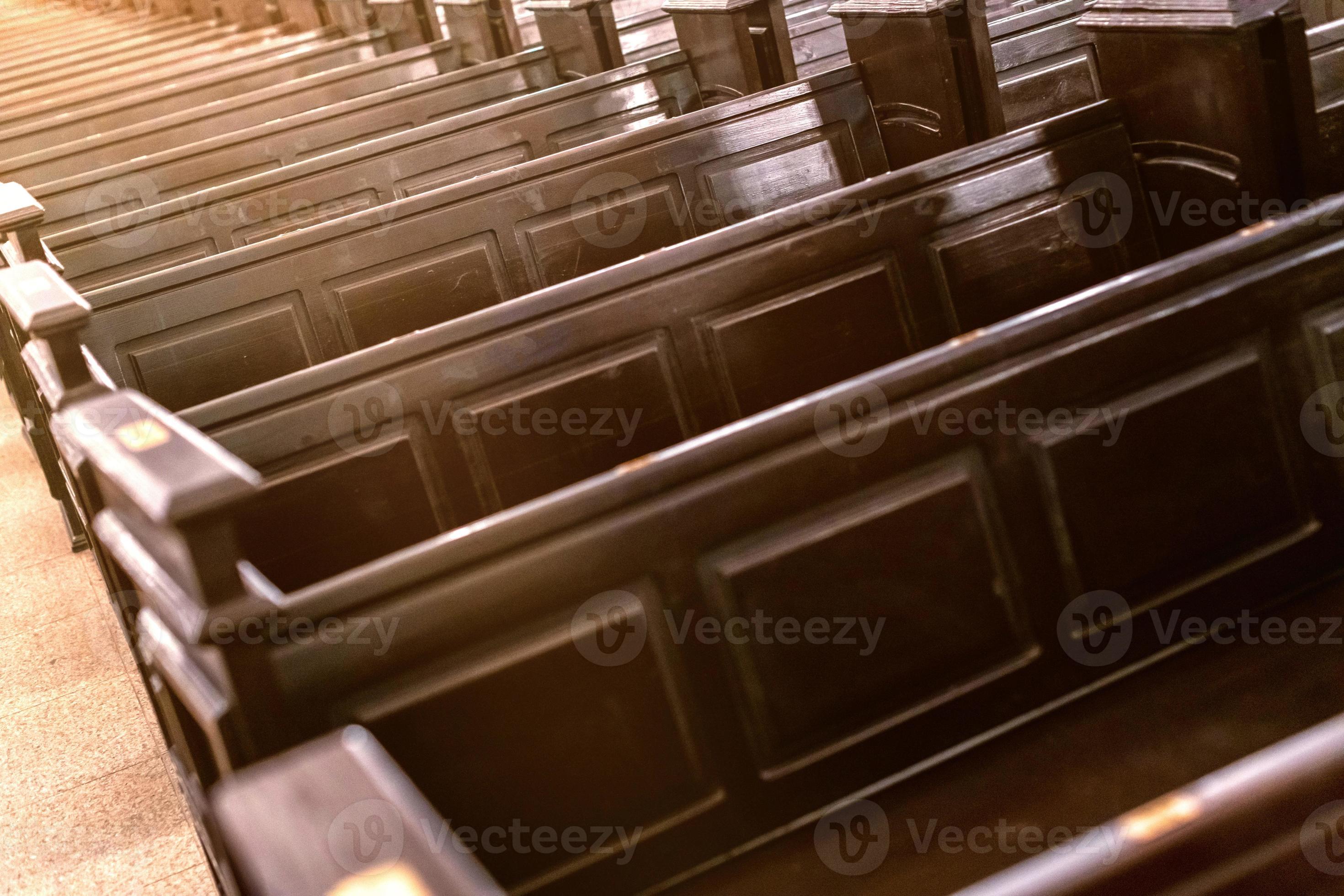 Cathedral pews. Rows of benches in christian church. Heavy solid