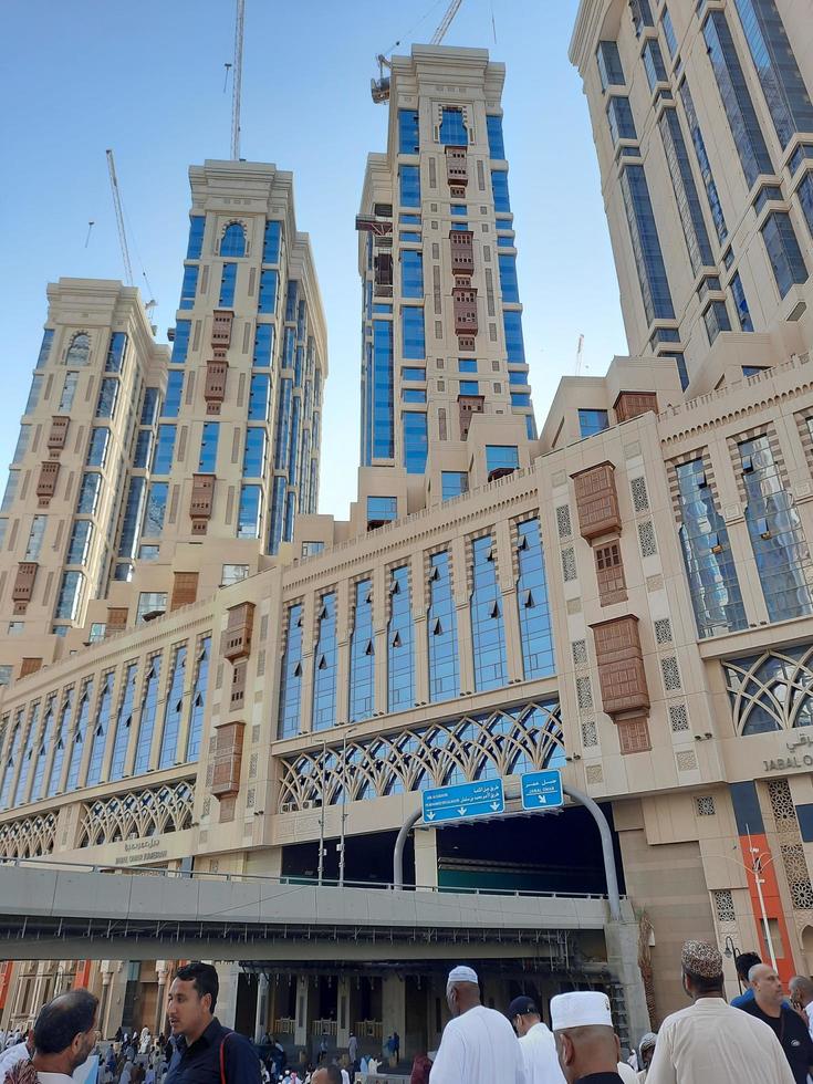 Mecca, Saudi Arabia, Nov 2022 - A beautiful view of Jabal Omar residential complex and visitors from different countries on the road in front of Masjid al-Haram, Makkah, Saudi Arabia. photo