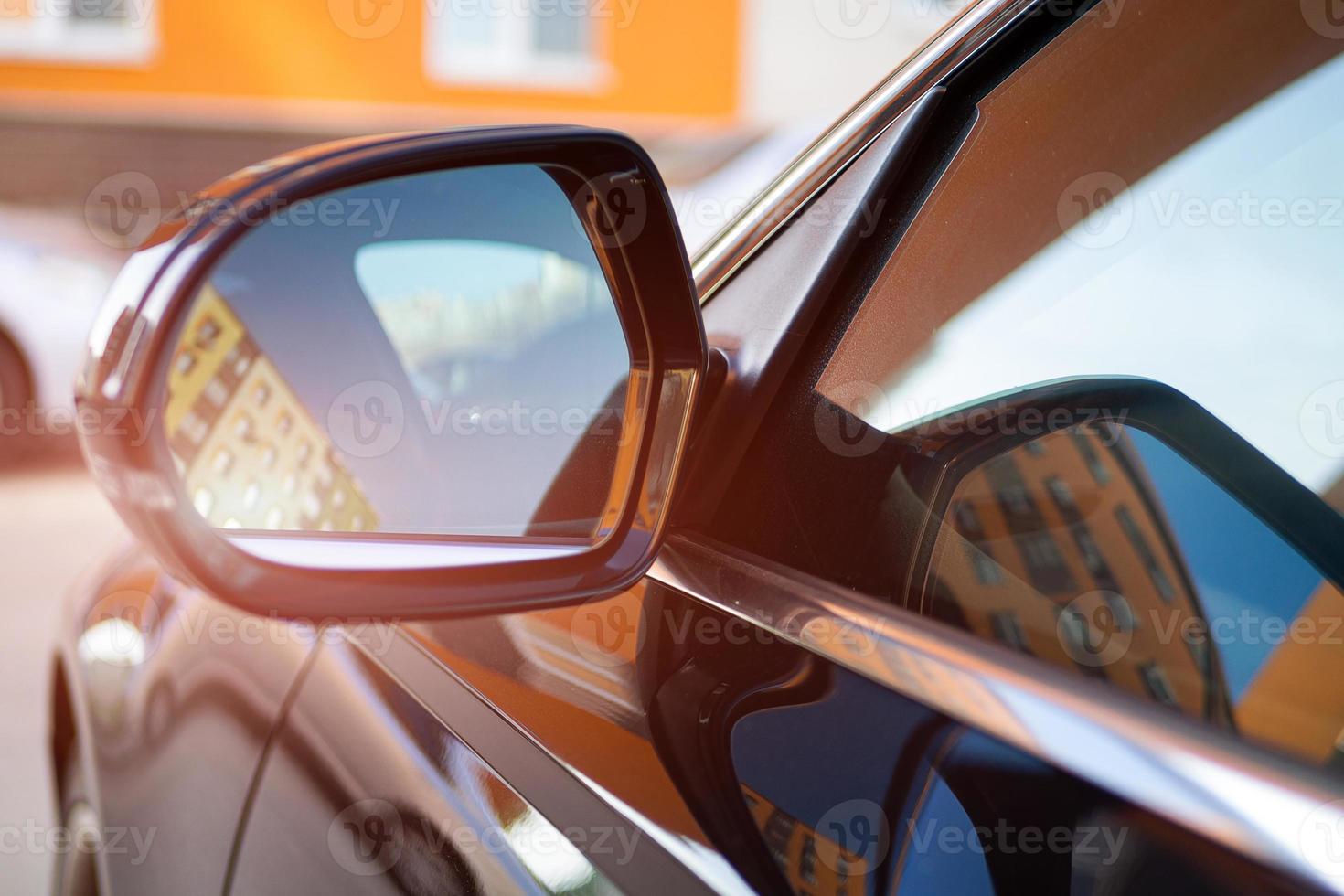 Anti-glare rearview mirror on a black car. photo