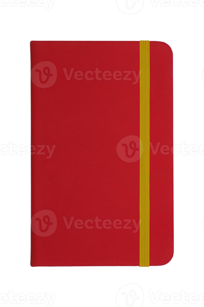 Red notebook with yellow elastic band photo