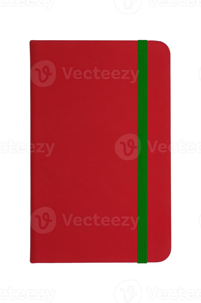 Red notebook with green elastic band photo