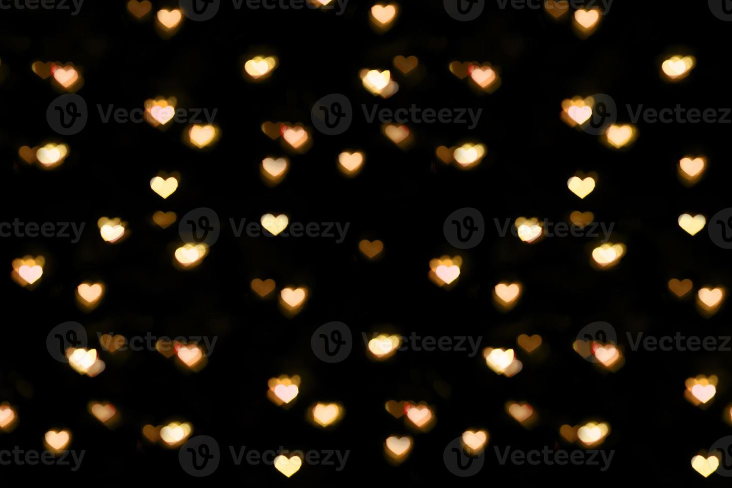 Golden heart-shaped bokeh. Overlay. Valentine's Day photo
