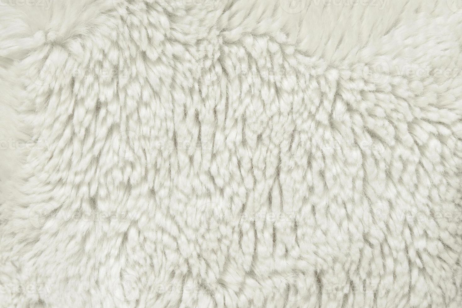 Background from white soft long-haired fur. Pattern for design. Graphic element photo