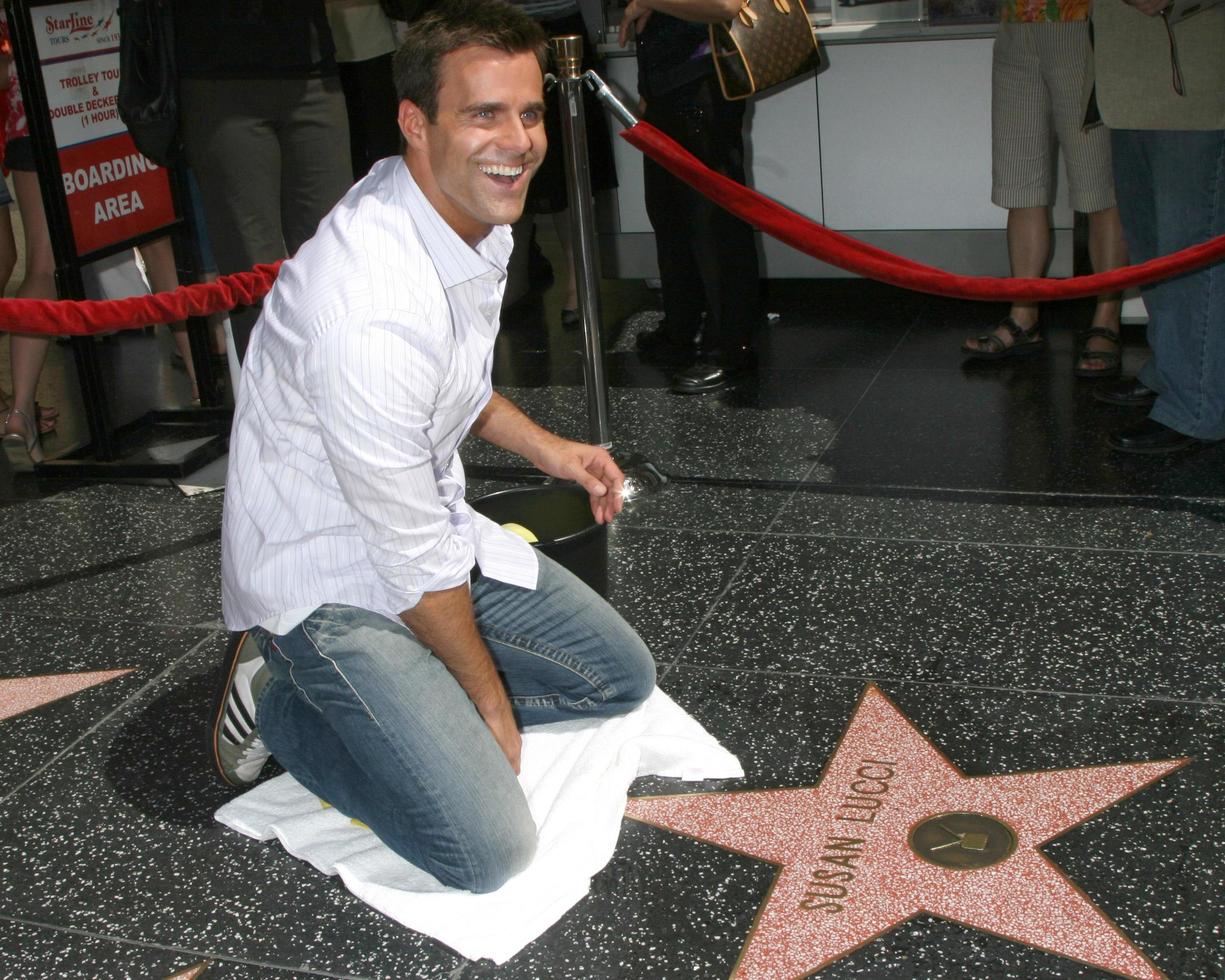 Cameron Mathison cleaning the Susan Lucci Star on the Hollywood Walk of Fame adjacent to the Kodak Theater piror to Daytime Emmys at the Hollywood and Highland complex in Hollywood, CA June 19, 2008 photo