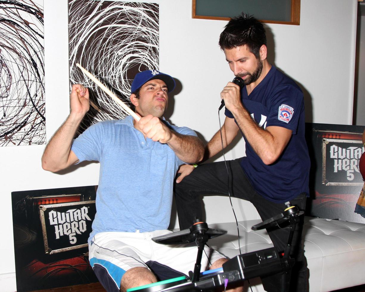 Zachary Levi and Joshua Gomez Chuck Kickoff party presented by Guitar Hero Five Roosevelt Hotel Pool Los Angeles, CA October 10, 2009 photo