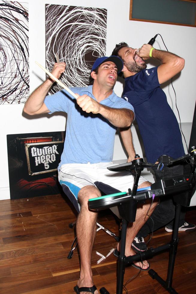 Zachary Levi and Joshua Gomez Chuck Kickoff party presented by Guitar Hero Five Roosevelt Hotel Pool Los Angeles, CA October 10, 2009 photo