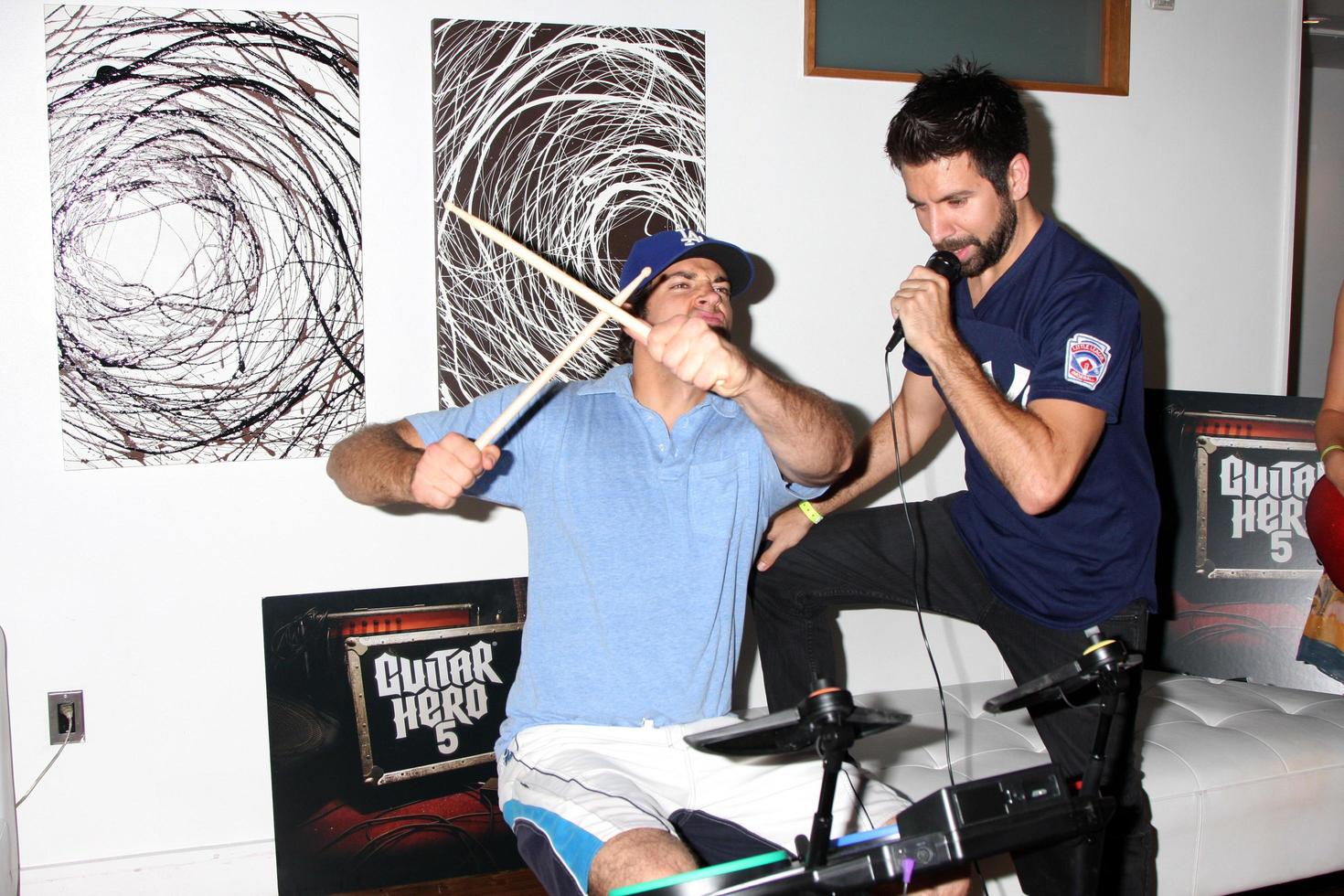 Zachary Levi and Joshua Gomez Chuck Kickoff party presented by Guitar Hero Five Roosevelt Hotel Pool Los Angeles, CA October 10, 2009 photo