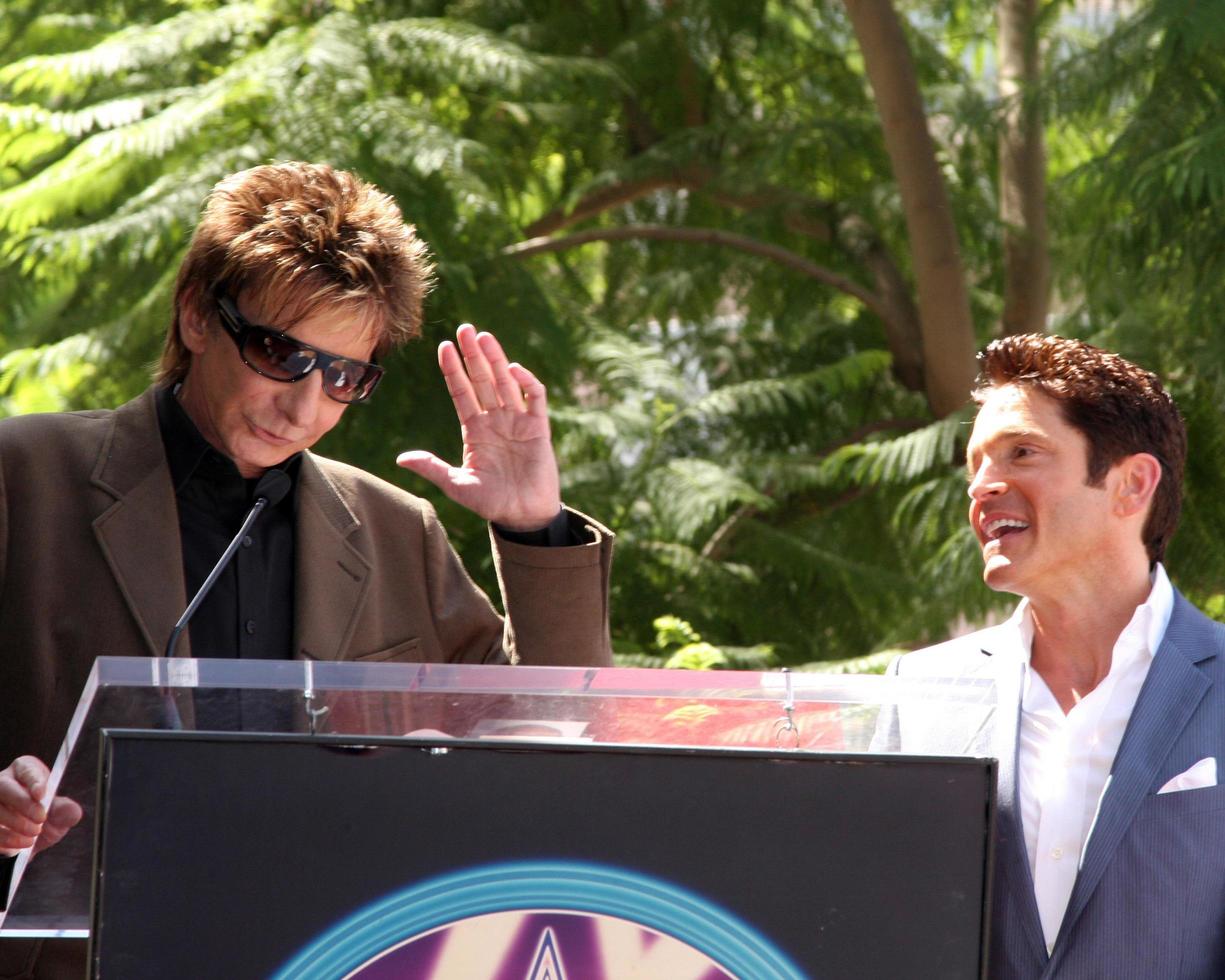 Barry Manilow at the Hollywood Walk of Fame Star Ceremony honoring Dave Koz Capital Building in Hollywood Los Angeles, CA September 22, 2009 photo