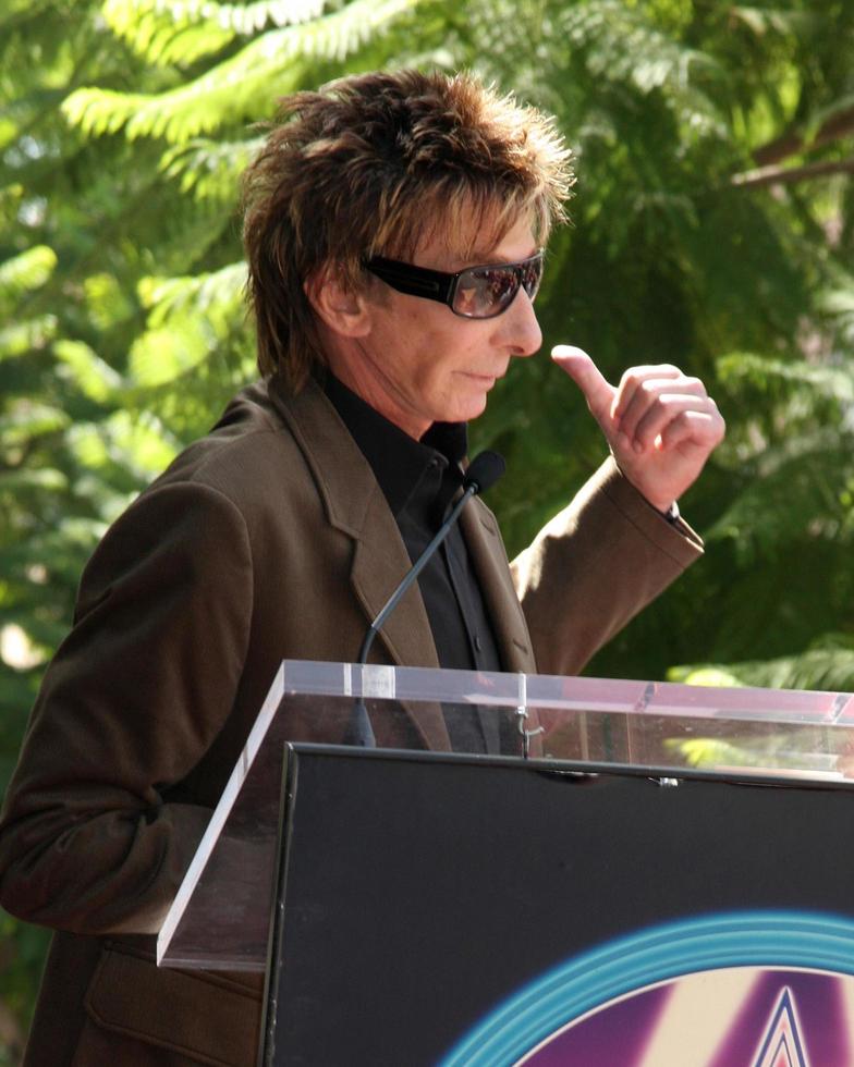 Barry Manilow at the Hollywood Walk of Fame Star Ceremony honoring Dave Koz Capital Building in Hollywood Los Angeles, CA September 22, 2009 photo