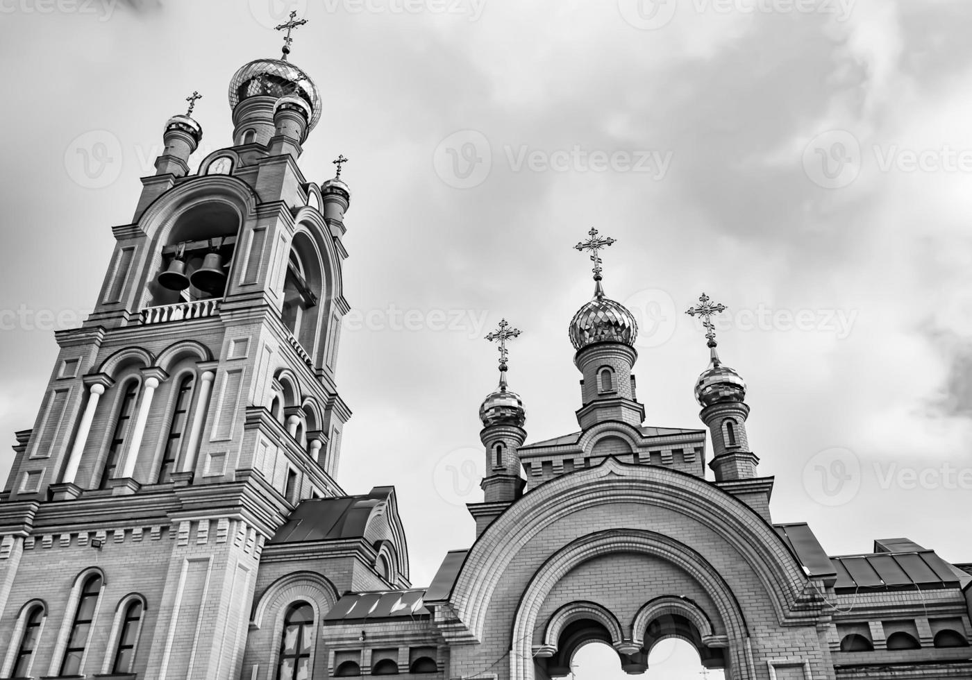Christian church cross in high steeple tower for prayer photo
