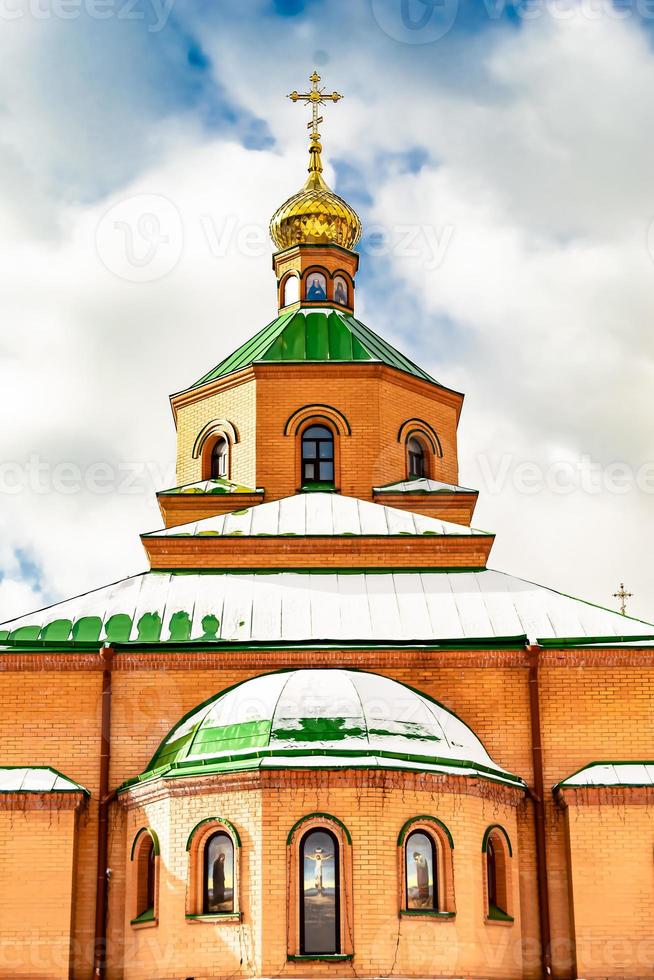 Christian church cross in high steeple tower for prayer photo