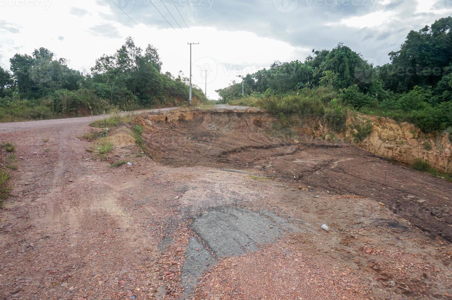 Heavy rain caused Landslide. Trans provincial road east kalimantan, Indonesia. photo