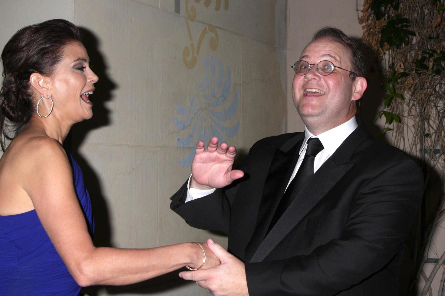LOS ANGELES, OCT 4 - Teri Hatcher, Marc Cherry arrives at Broadway Tonight An Evening of Song and Dance at Alex Theater on October 4, 2010 in Glendale, CA photo