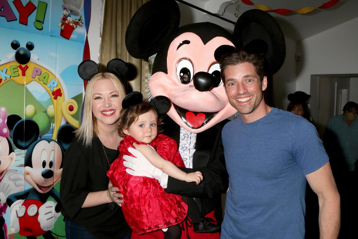LOS ANGELES, DEC 4 - Adrienne Frantz Bailey, Amelie Bailey, Scott Bailey, Mickey Mouse character at the Amelie Bailey s 1st Birthday Party at Private Residence on December 4, 2016 in Studio CIty, CA photo