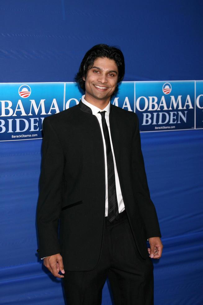 Rupak Ginn arriving at the Countdown for Barack Obama Event at a private home in Beverly Hills, CA on October 17, 2008 photo