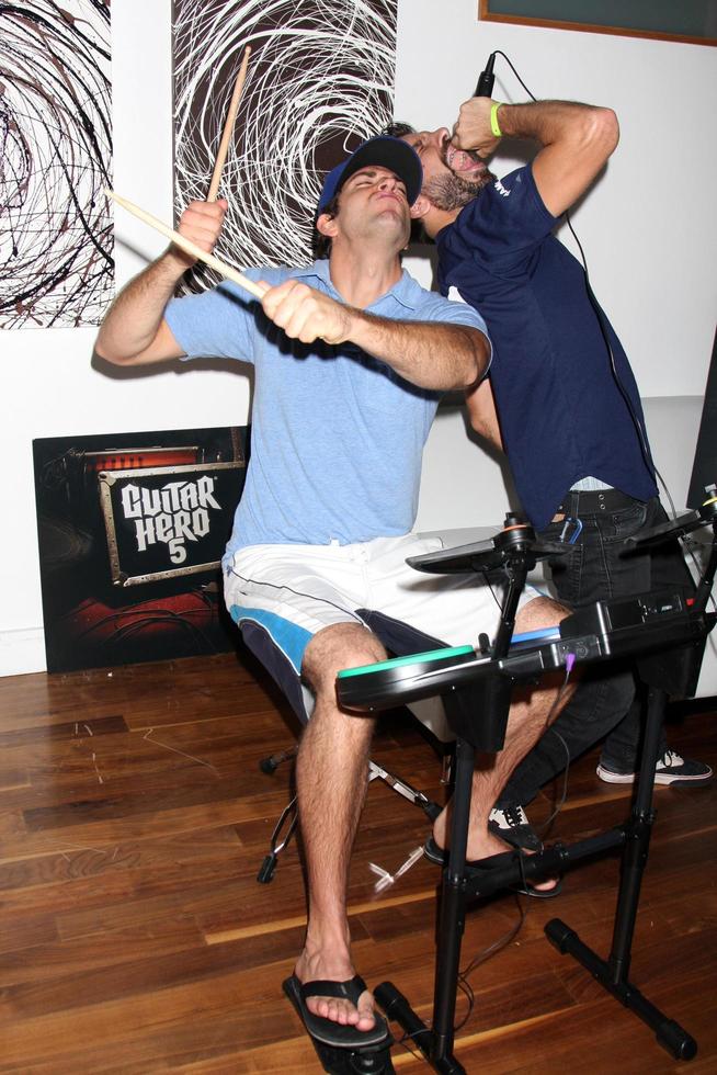 Zachary Levi and Joshua Gomez Chuck Kickoff party presented by Guitar Hero Five Roosevelt Hotel Pool Los Angeles, CA October 10, 2009 photo