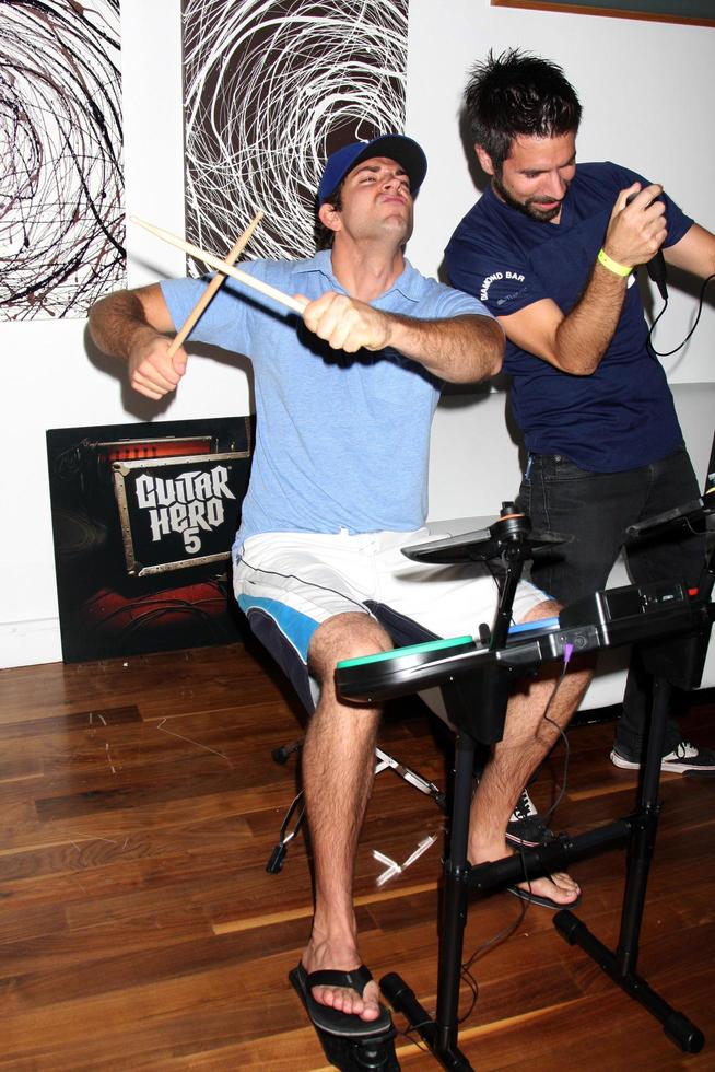 Zachary Levi and Joshua Gomez Chuck Kickoff party presented by Guitar Hero Five Roosevelt Hotel Pool Los Angeles, CA October 10, 2009 photo