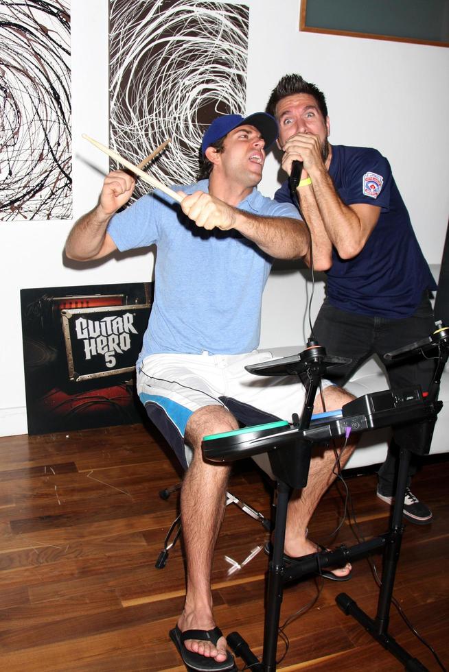 Zachary Levi and Joshua Gomez Chuck Kickoff party presented by Guitar Hero Five Roosevelt Hotel Pool Los Angeles, CA October 10, 2009 photo