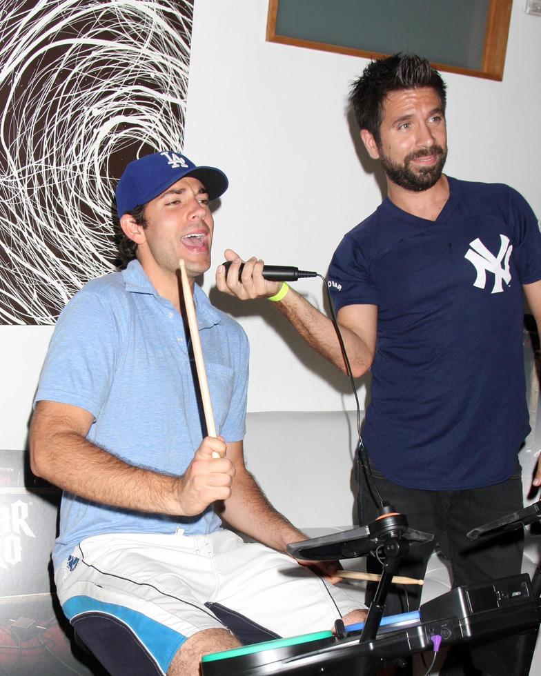 Zachary Levi, Joshua Gomez Chuck Kickoff party presented by Guitar Hero Five Roosevelt Hotel Pool Los Angeles, CA October 10, 2009 photo