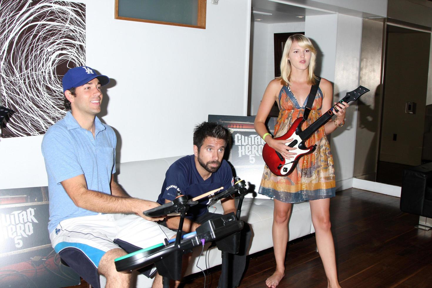 Zach Levi, Joshua Gomez, Ashley Campbell Chuck Kickoff party presented by Guitar Hero Five Roosevelt Hotel Pool Los Angeles, CA October 10, 2009 photo