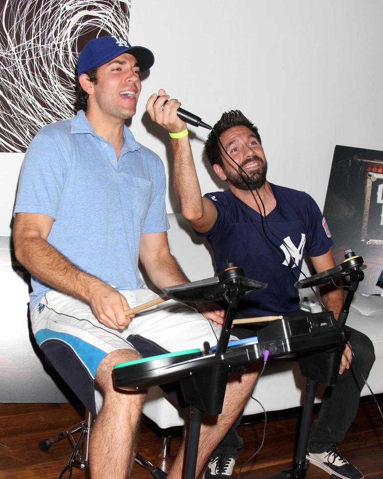 Zachary Levi and Joshua Gomez Chuck Kickoff party presented by Guitar Hero Five Roosevelt Hotel Pool Los Angeles, CA October 10, 2009 photo