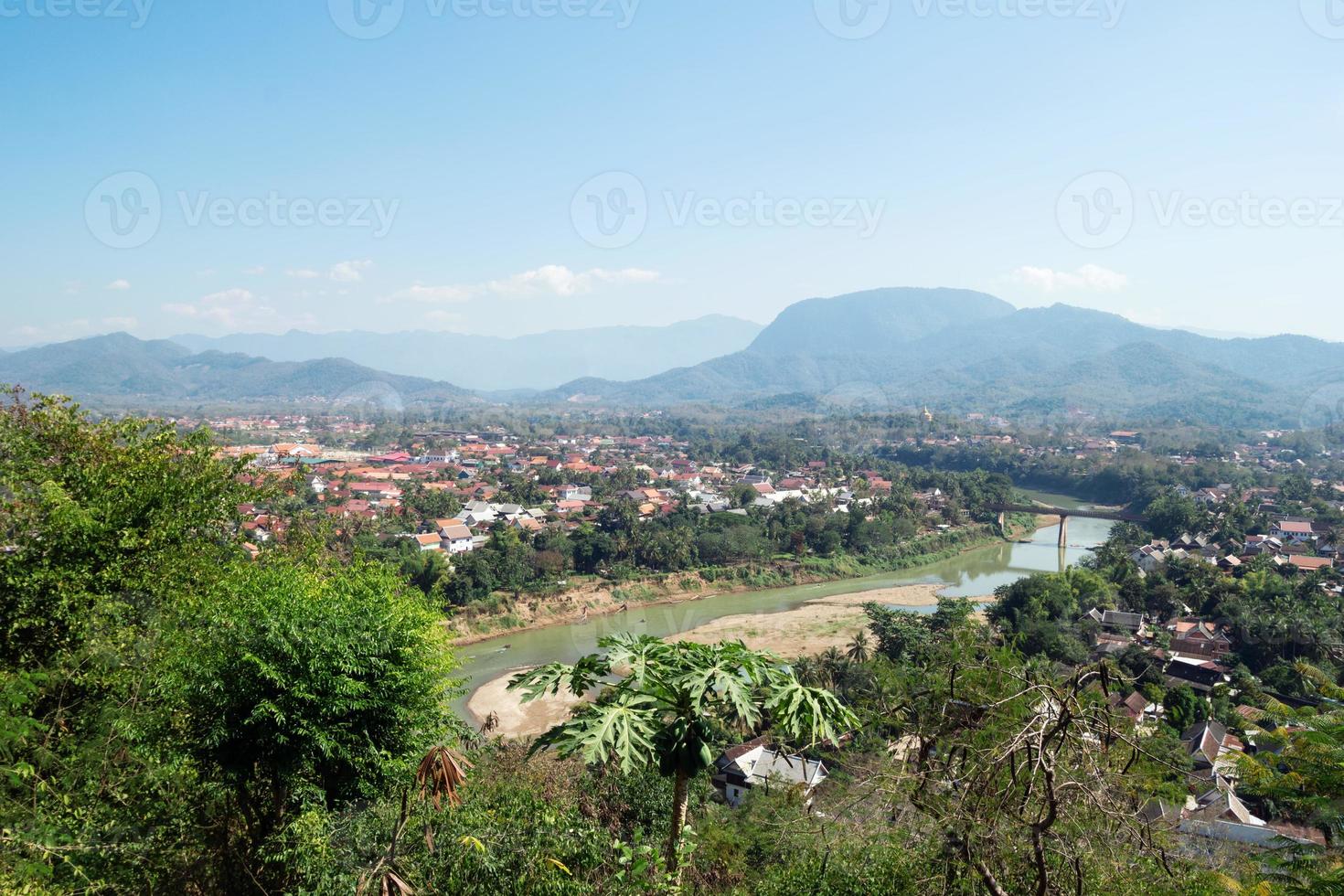 View on the city, river and mountains from hill. Luang Prabang, Laos. One of the most popular and touristic place in country. photo