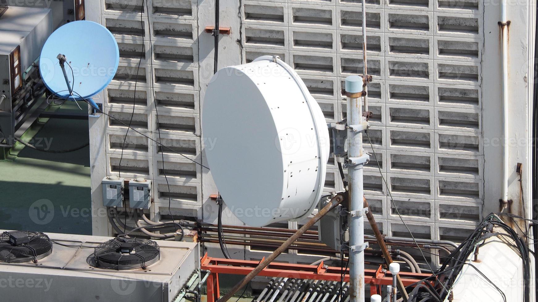 Old big telecommunication satellite dish. photo