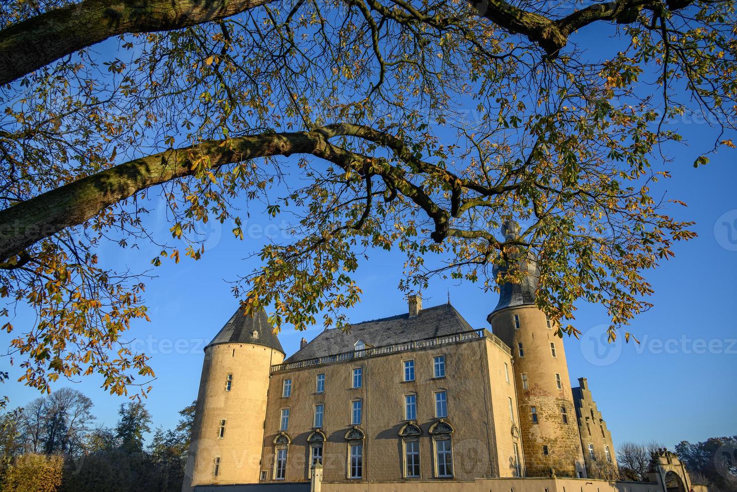 autumn at a castle in westphalia photo