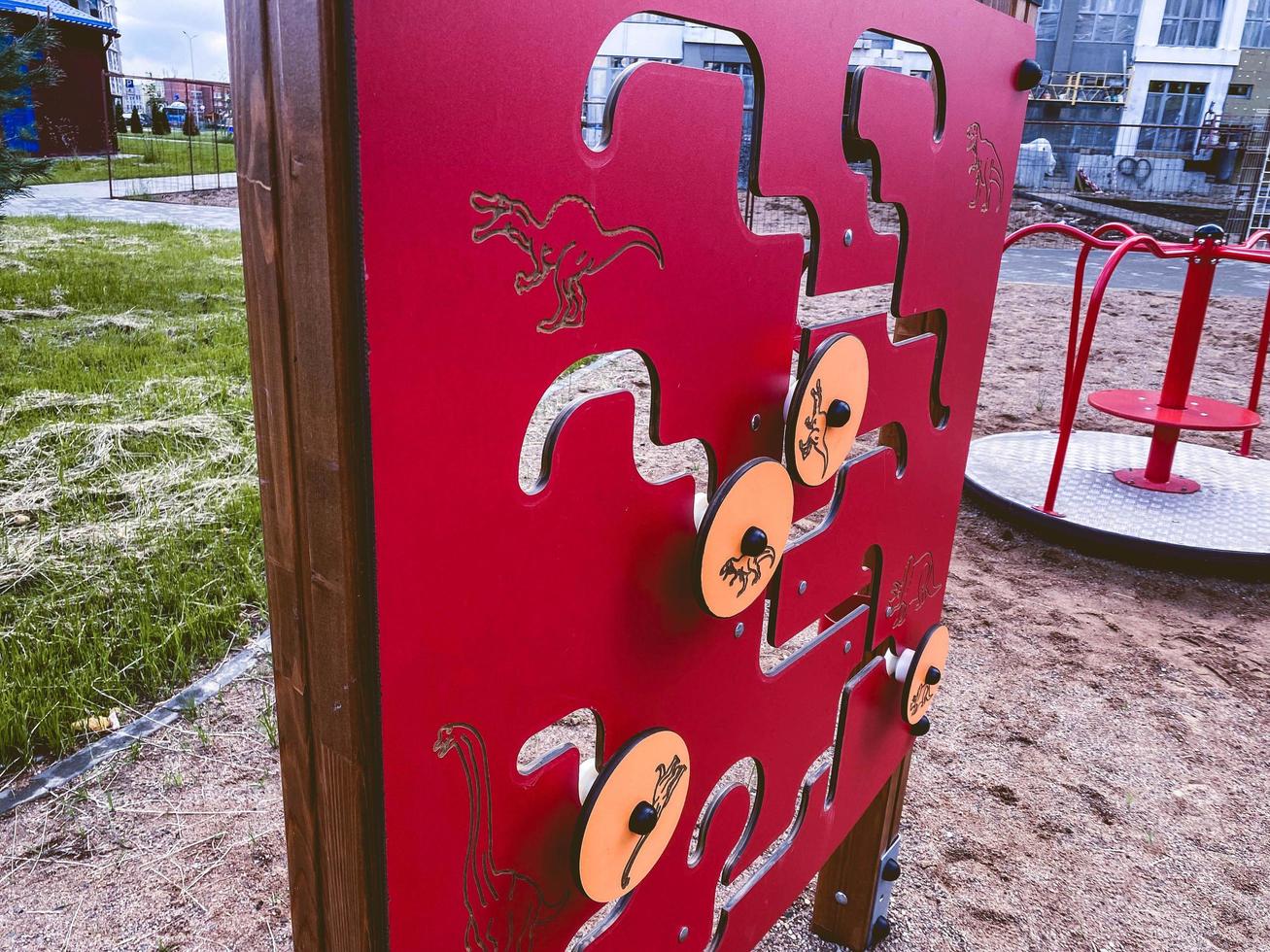 maze for children on the playground. outdoor games. maze game and finding a way to develop the logic of the child in the fresh air photo