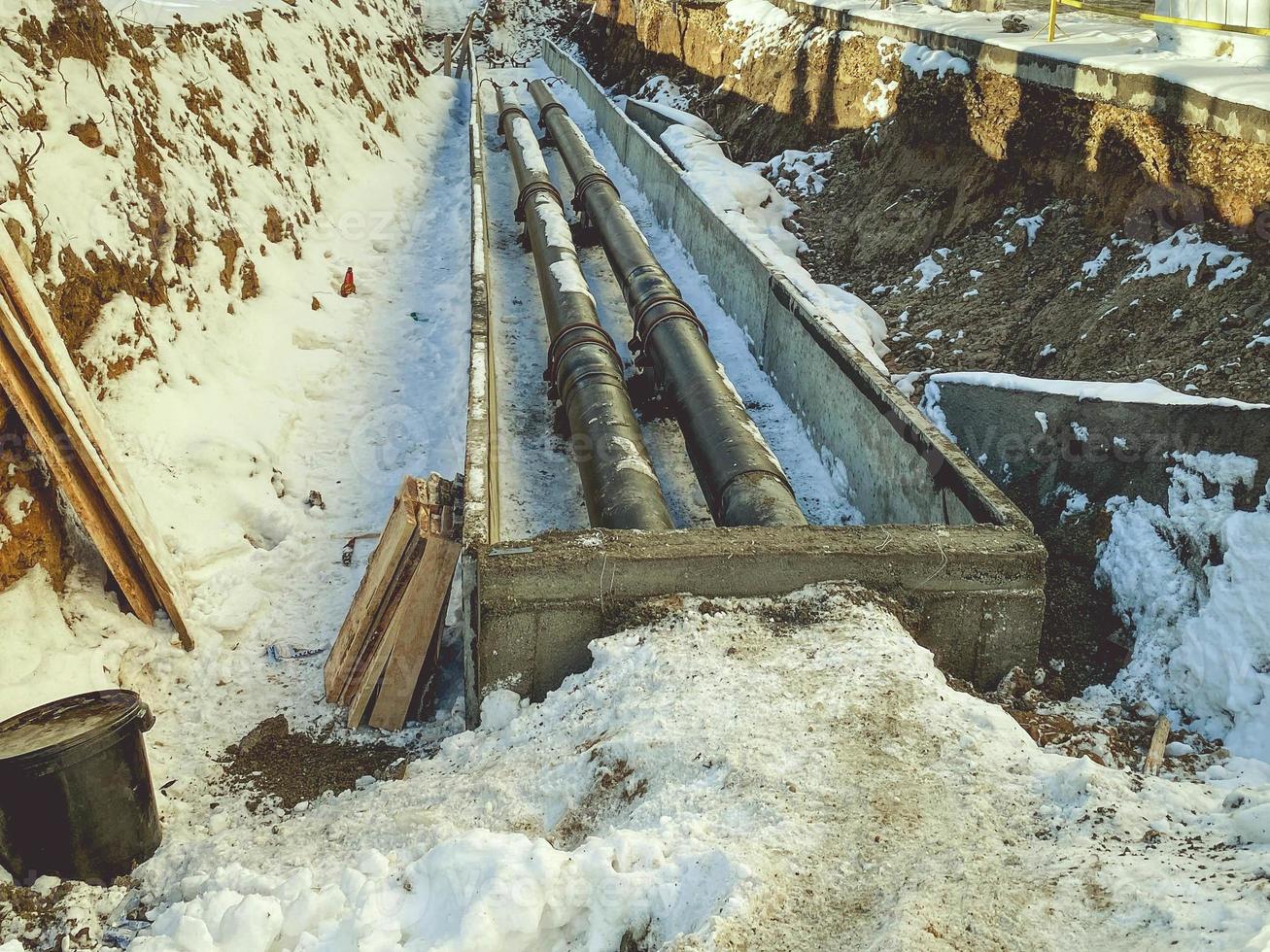 small, black, narrow pipes for laying plumbing communications