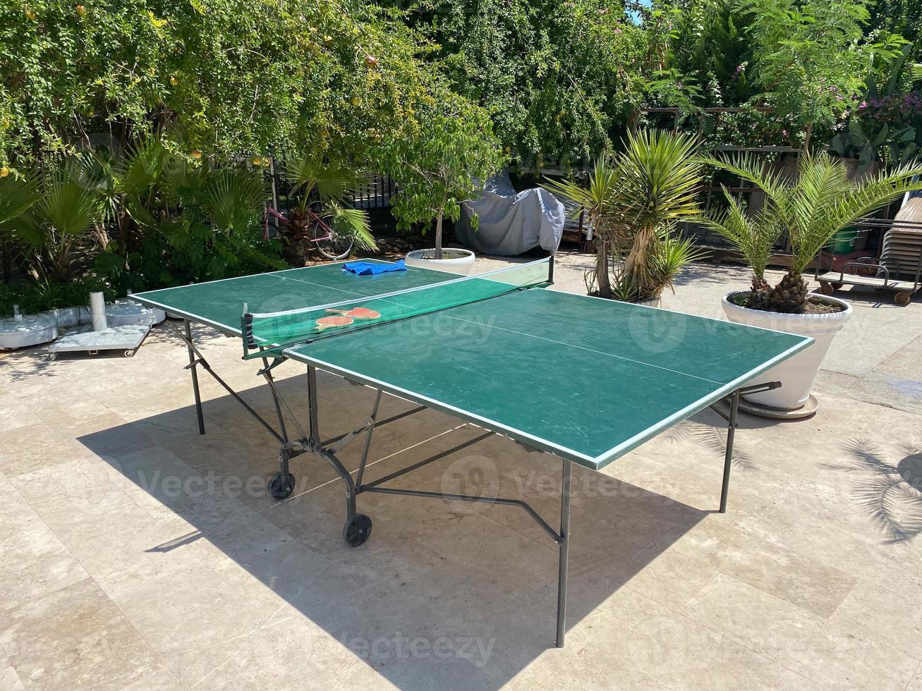 ping pong table outdoors. Table tennis equipment in park. Front view, product display photo