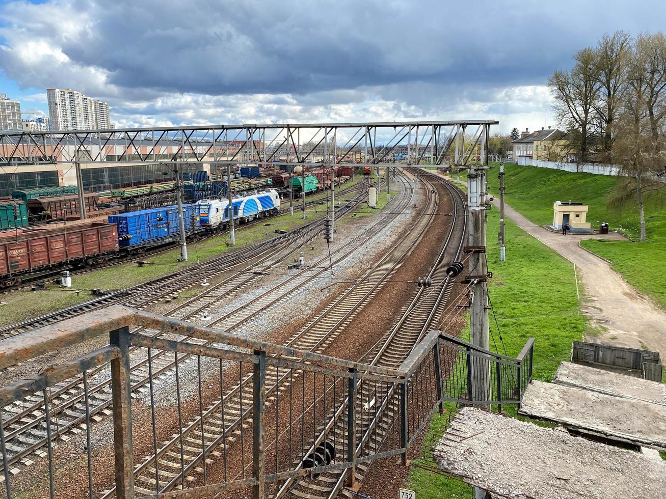 Railway wagons with cargo of metal and grain in port of Odessa. trains are waiting in line for loading at cargo terminal. most economical logistics solutions for rail transport photo