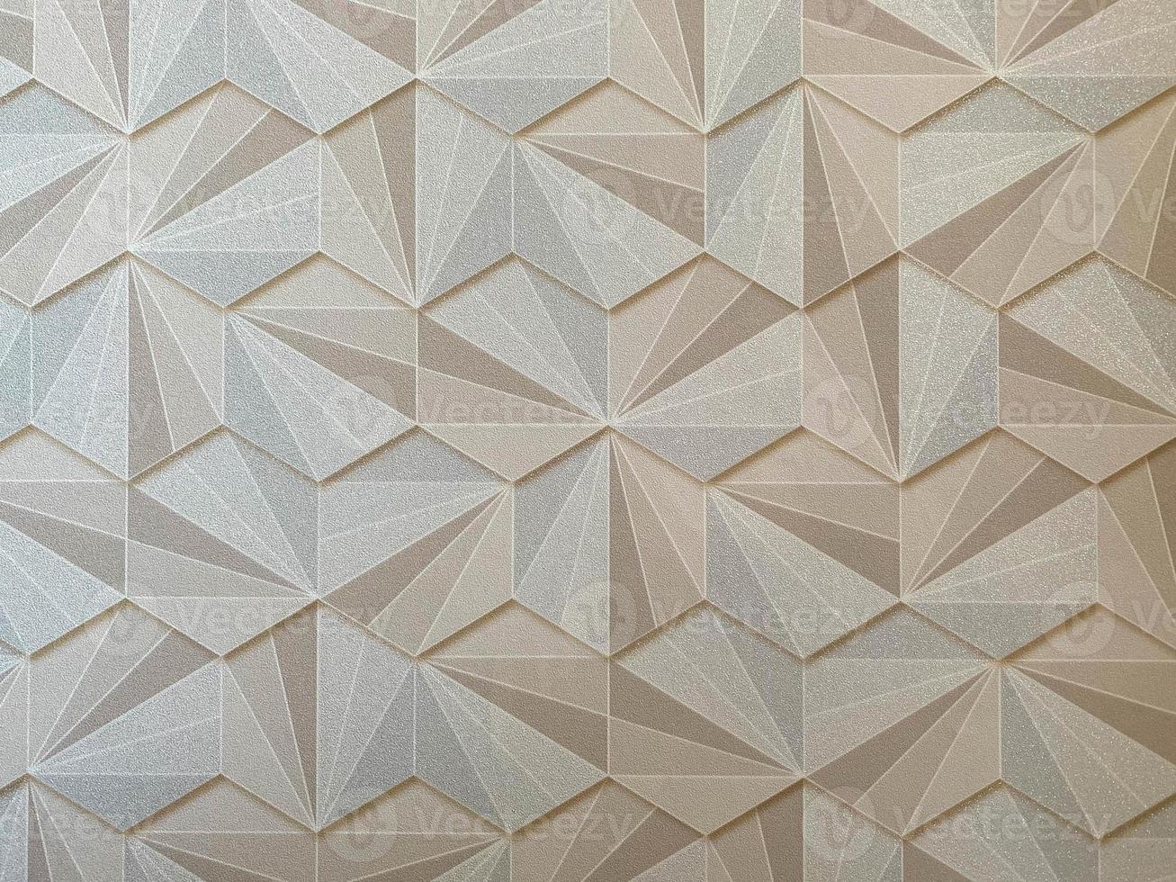 Texture abstract from many geometric shapes of yellow gold color hexagons. The background photo