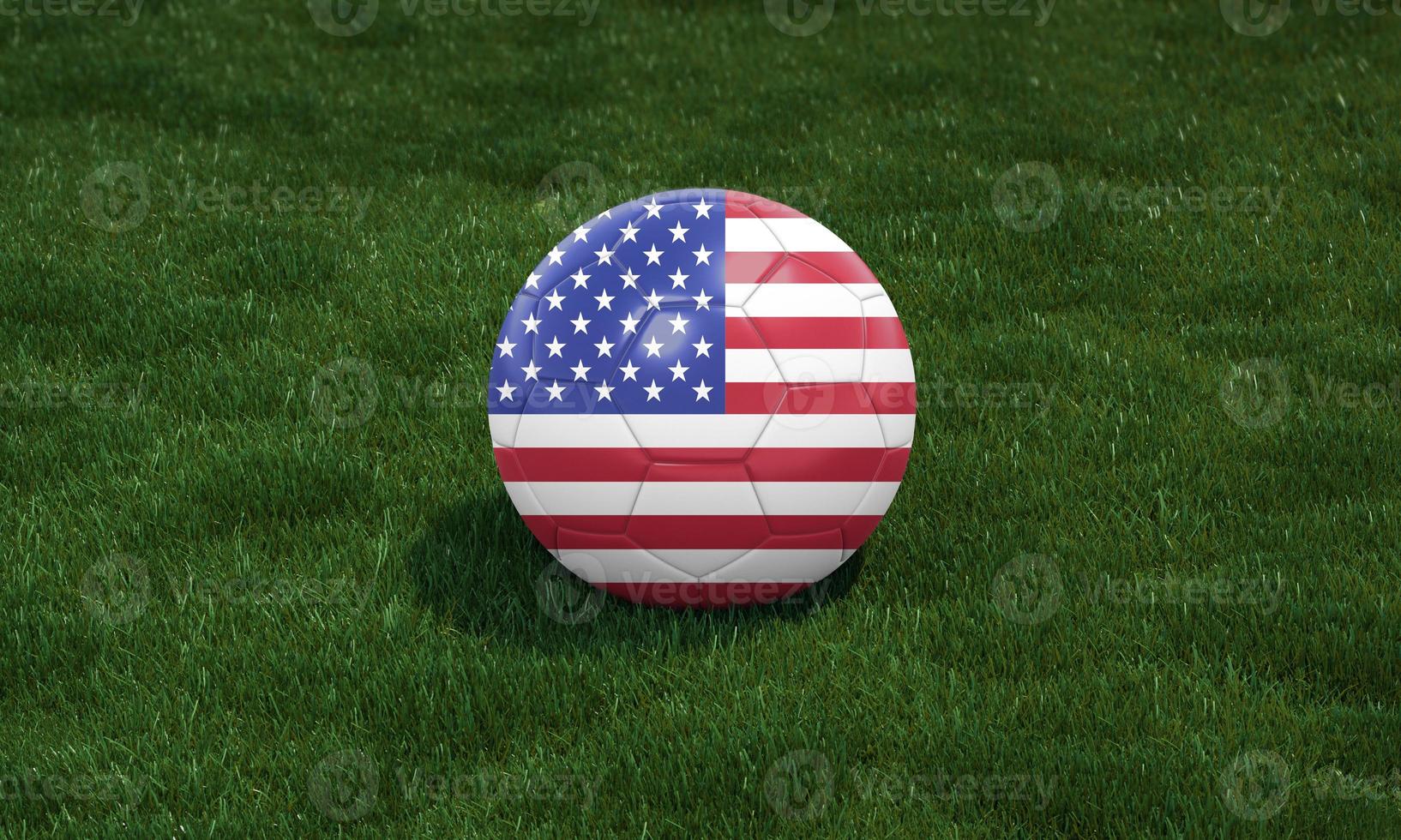 Soccer ball with USA flag colors at a stadium on green grasses background. photo