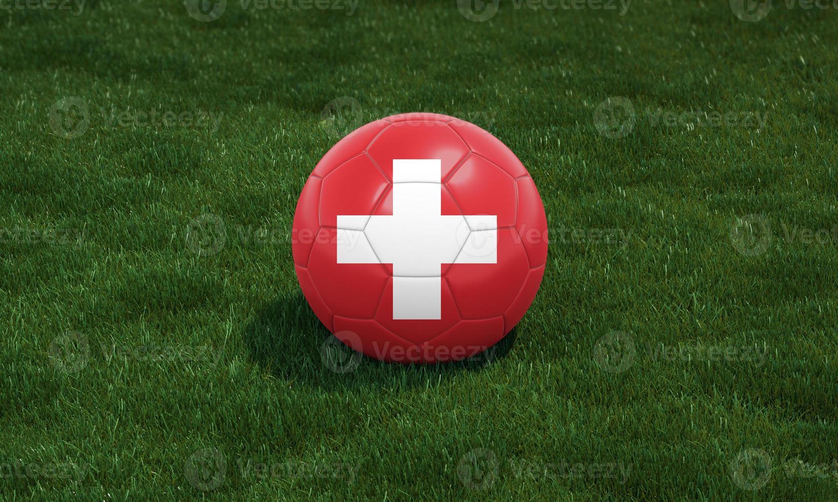 Soccer ball with Switzerland flag colors at a stadium on green grasses background. 3D illustration. photo