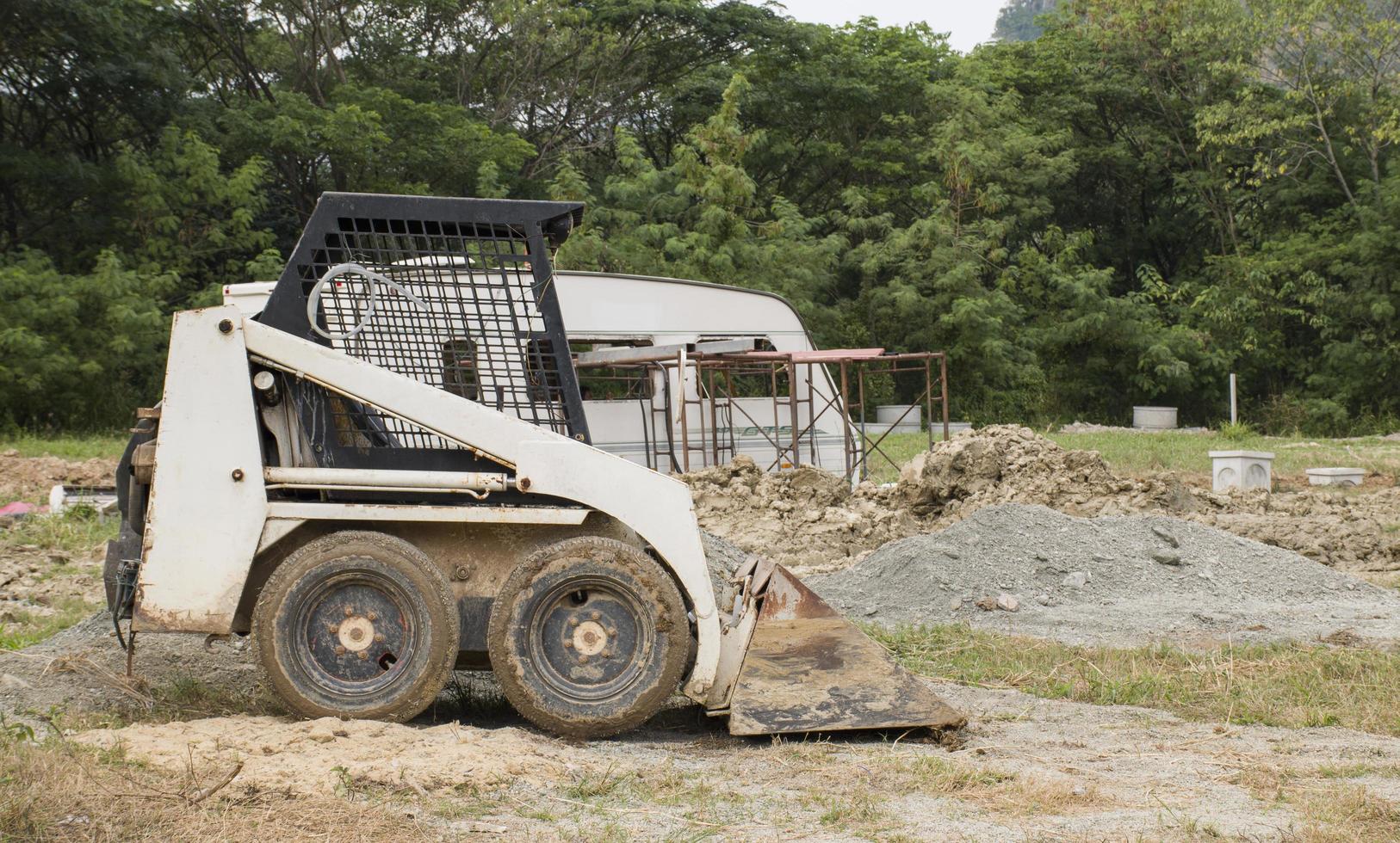 Mini excavator at the construction site. photo