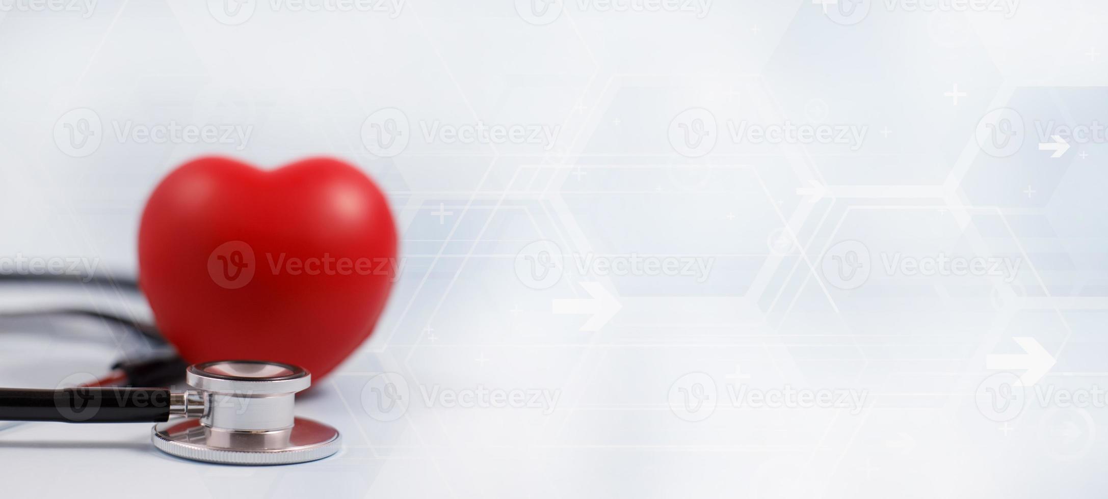 Concept stethoscope and red heart with Health insurance, doctor stethoscope and red heart check heart health care, instrument for checking heart on the white background represents exercise, isolated photo