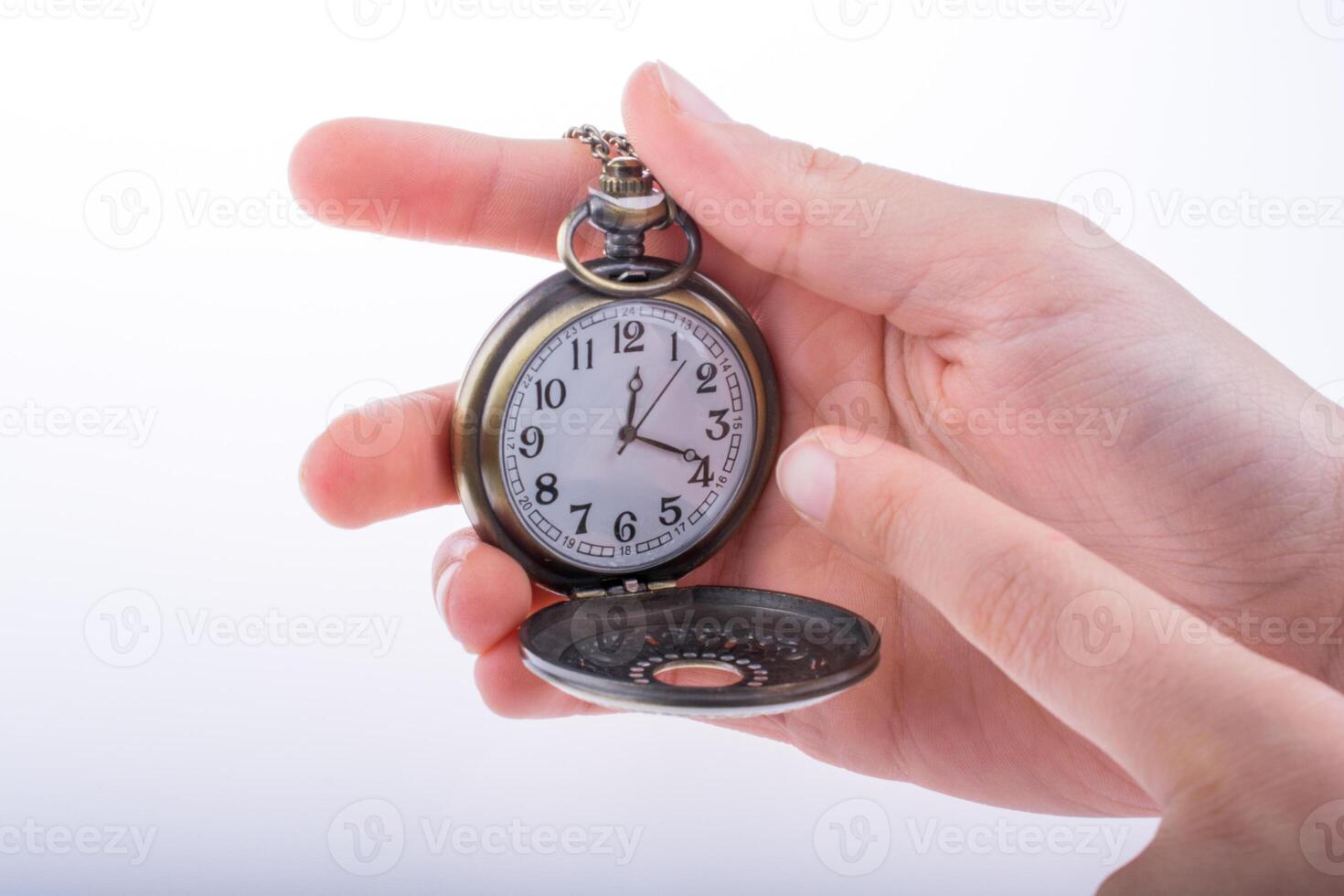 Pocket watch in hand 14745509 Stock Photo at Vecteezy