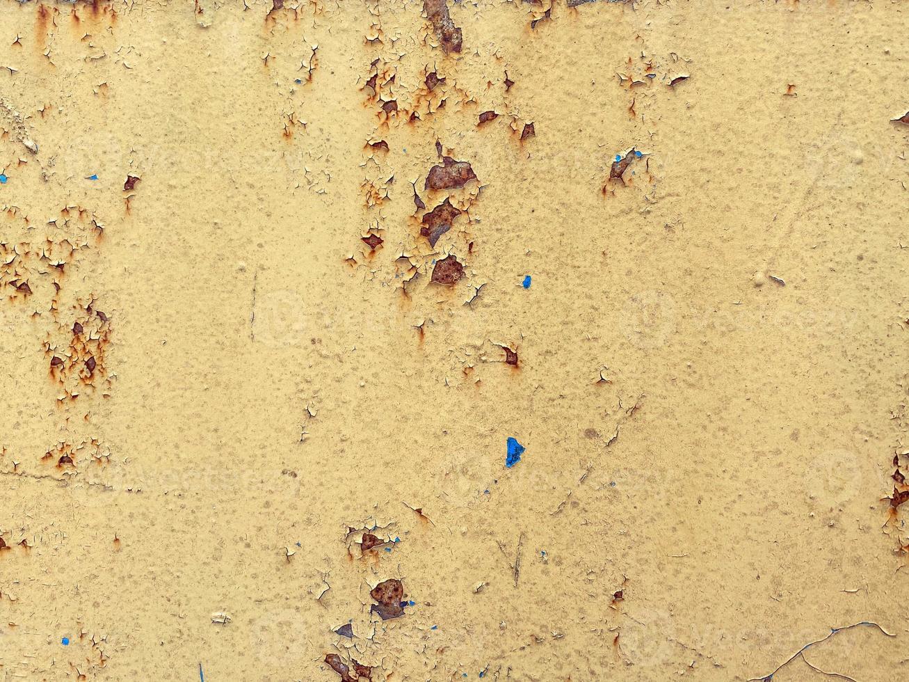 texture, old, rusty metal. background in retro style with scuffs and dents. corrosion spots formed on a piece of metal. damaged material, ancient and worn photo