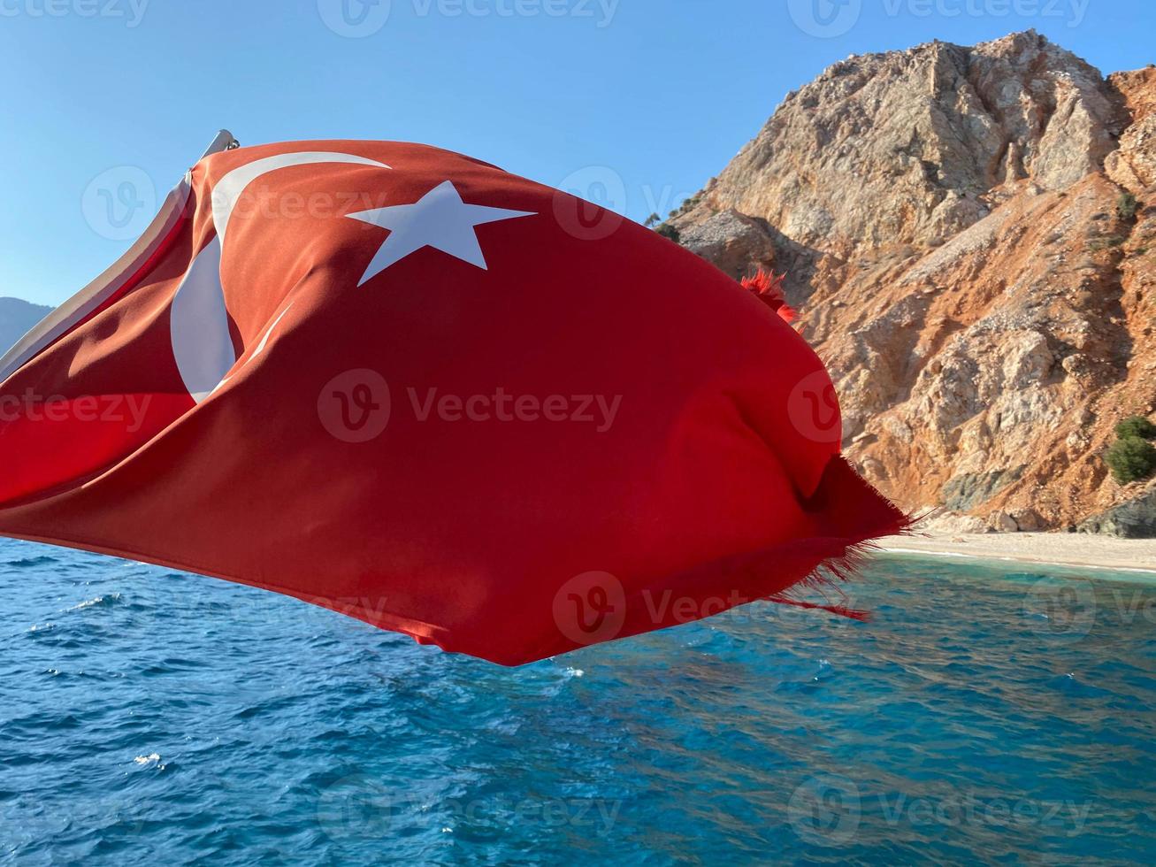 Waving turkey flag on a yacht bow photo