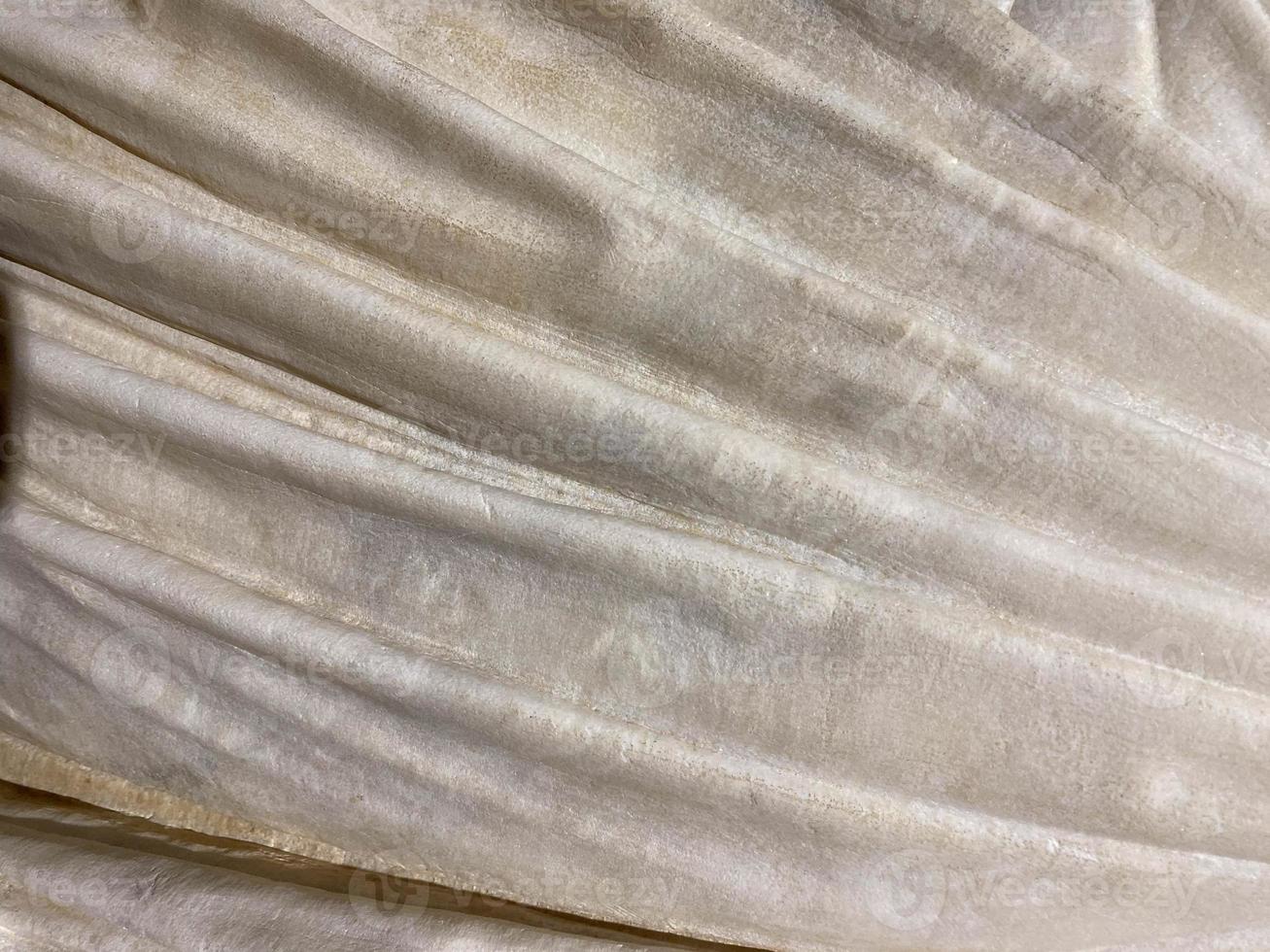 beautiful grey curly marble with golden veins. Abstract texture and background photo