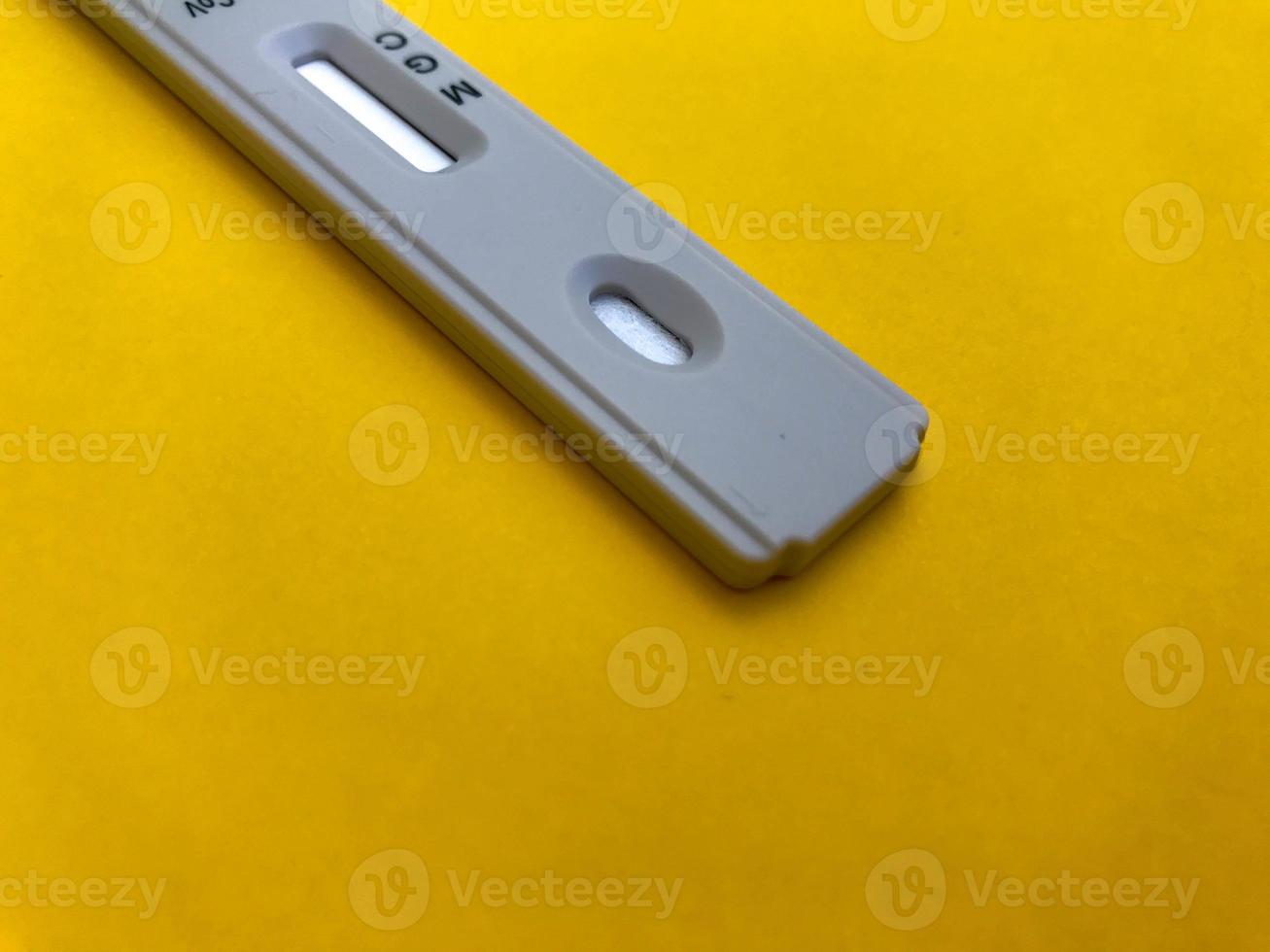 medical procedures. coronavirus test on a bright yellow background. new home self-diagnosis kit. medical procedures for the determination of IgG and IgM antibodies, sensitive test photo