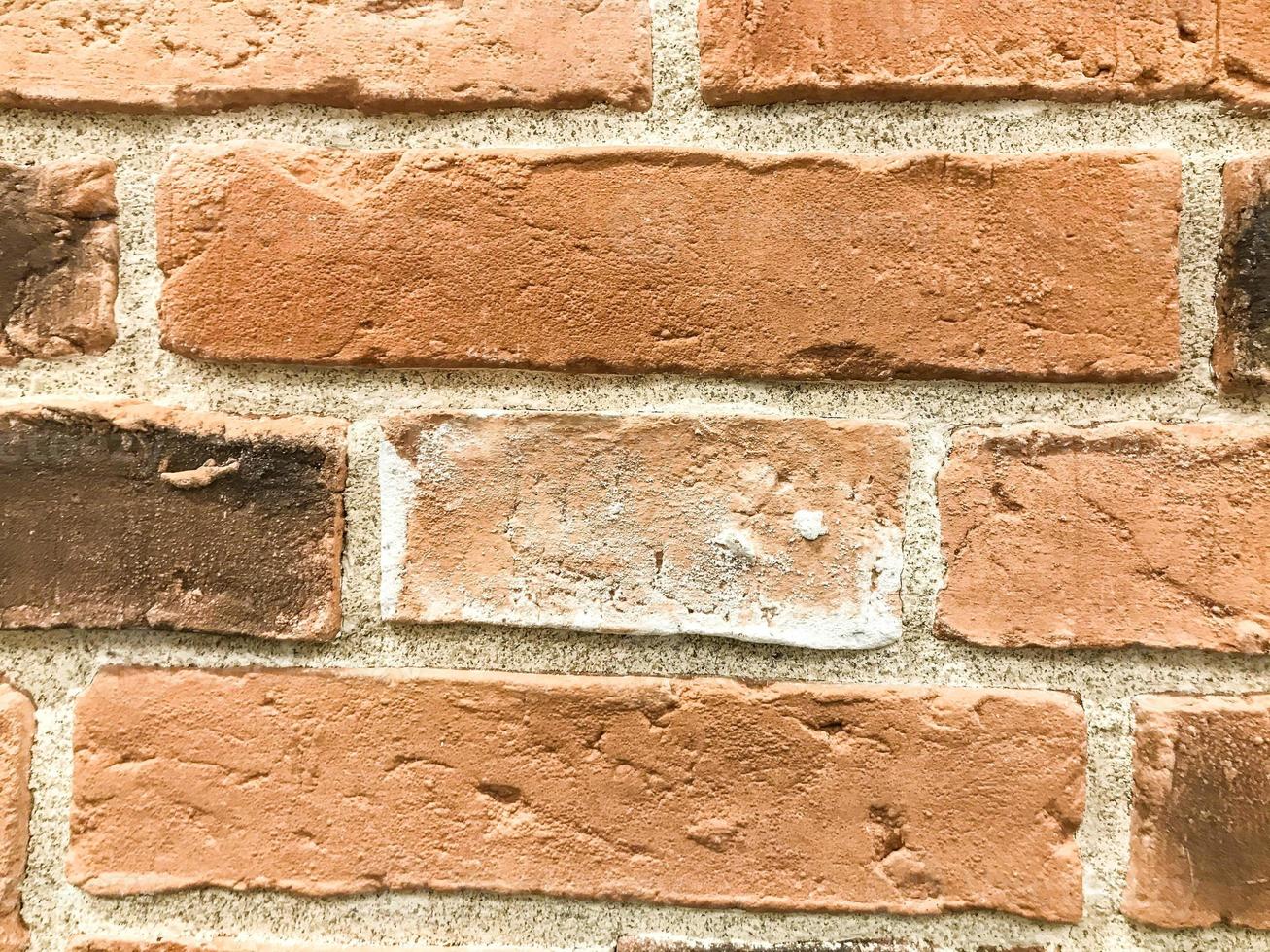 decorative brick for wall covering, texture. brown brick for wall covering. concrete brick for wall gluing, smooth finish photo