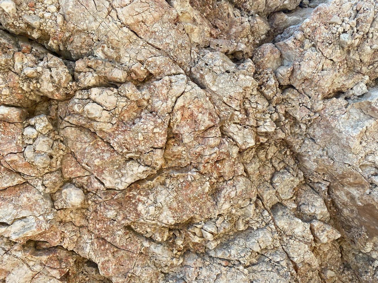 Stones texture and yellow background. Rock texture photo